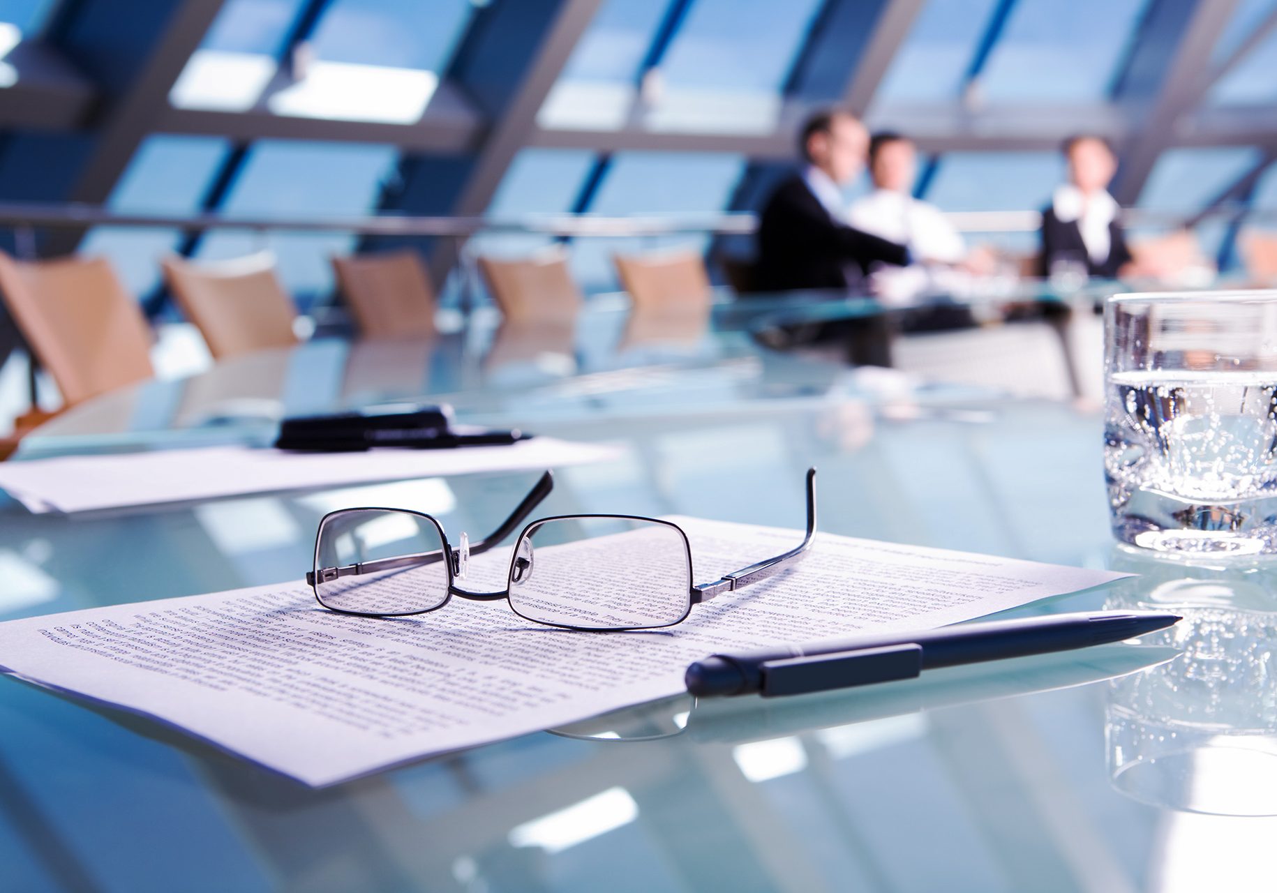 Image of several objects lying on the table in the conference room